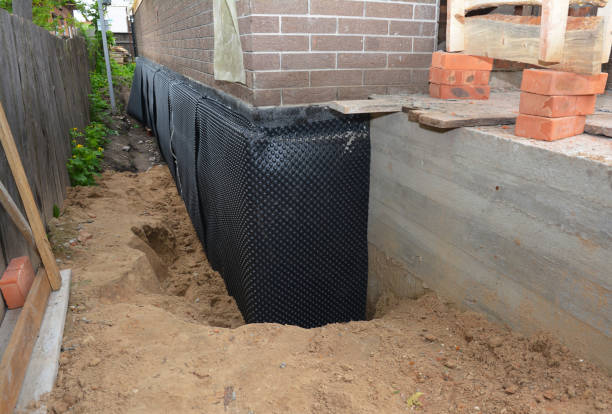 SJ Waterproofing Pros technician performing targeted Foundation Crack Repair assessment in Harleysville, PA